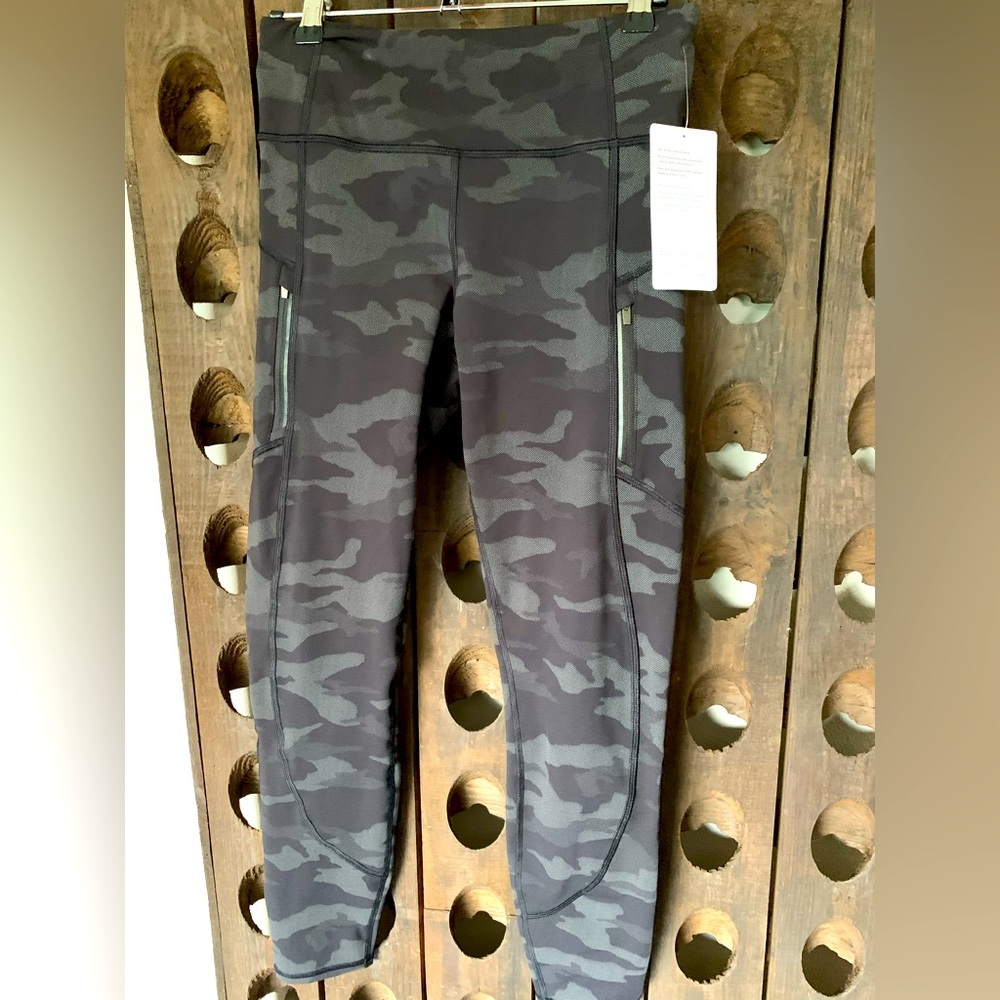 Athleta Rainier Reflective running tights-size SMALL